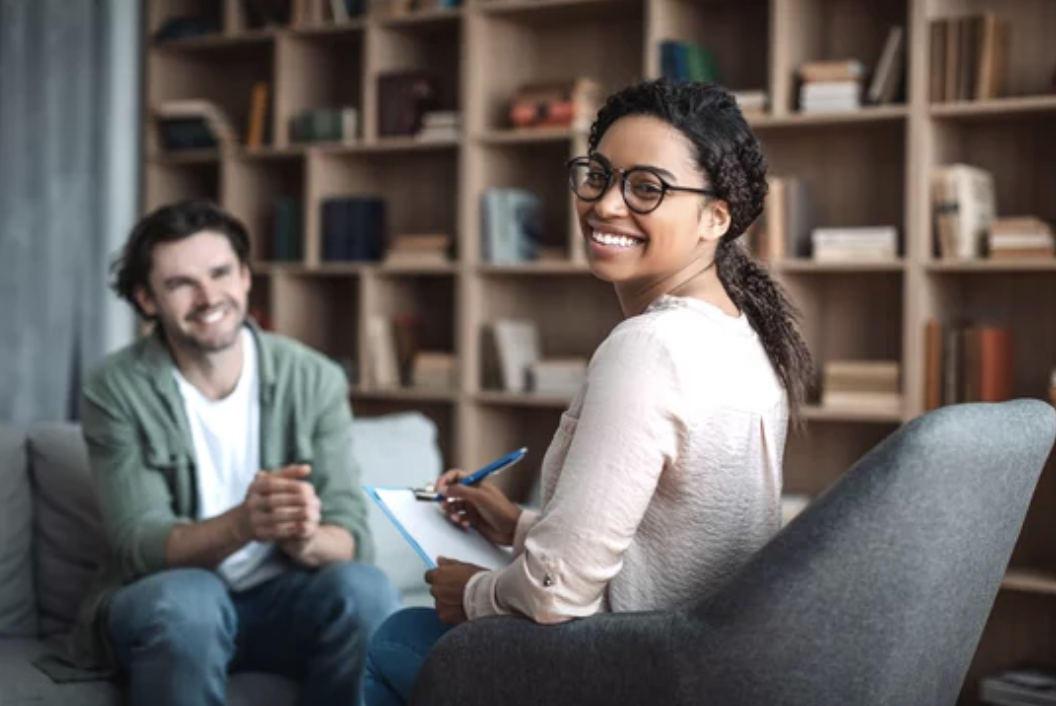 A therapist smiling during a session